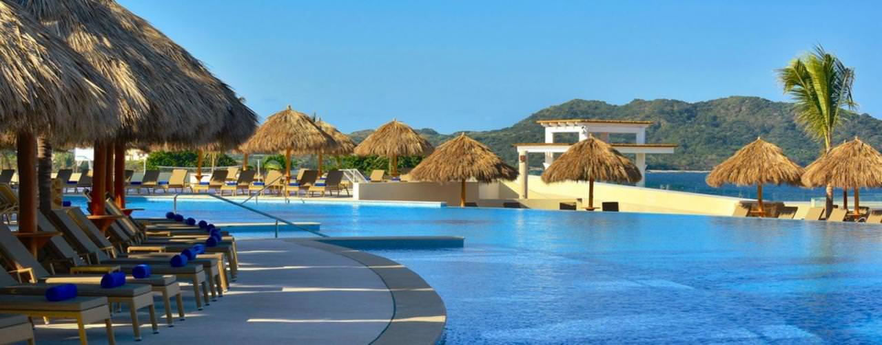 Iberostar Playa Mita Riviera Nayarit Puerto Vallarta Pool Lounge Chair Palapas Mountain View