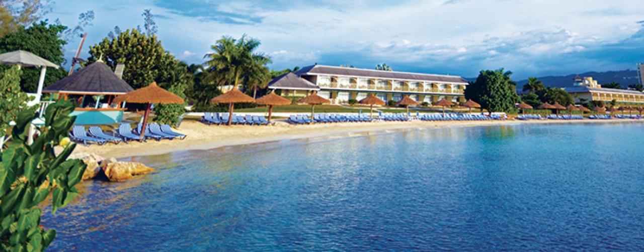 Montego Bay Jamaica Sunmb_beach_palapas3 Sunscape Cove Montego Bay